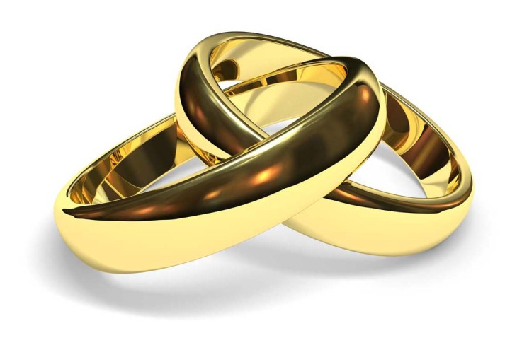 Golden wedding rings photo.